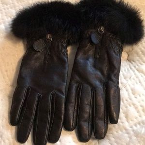 Danier leather gloves. Never worn. Size small
